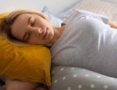 Why Do You Need a Pregnancy Pillow? Health Benefits and Sleeping Tips
